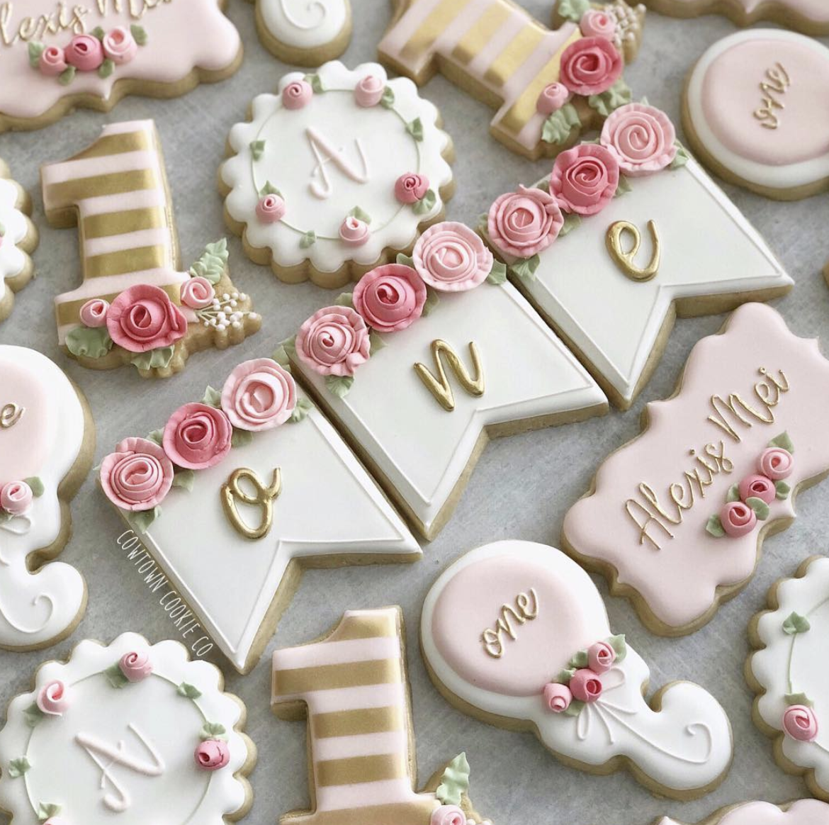 floral first birthday custom cookies