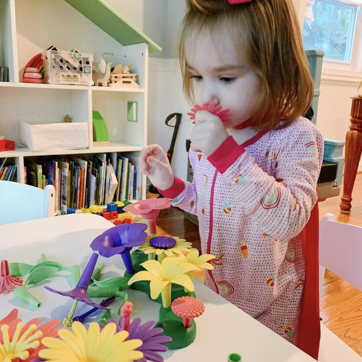 floral first birthday party toy